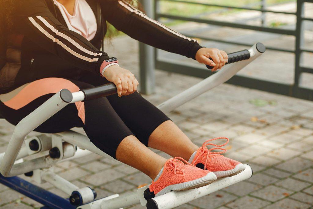 Woman working out on rowing machine