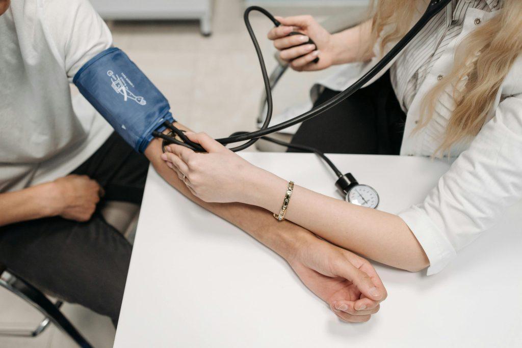Person getting their blood pressure taken