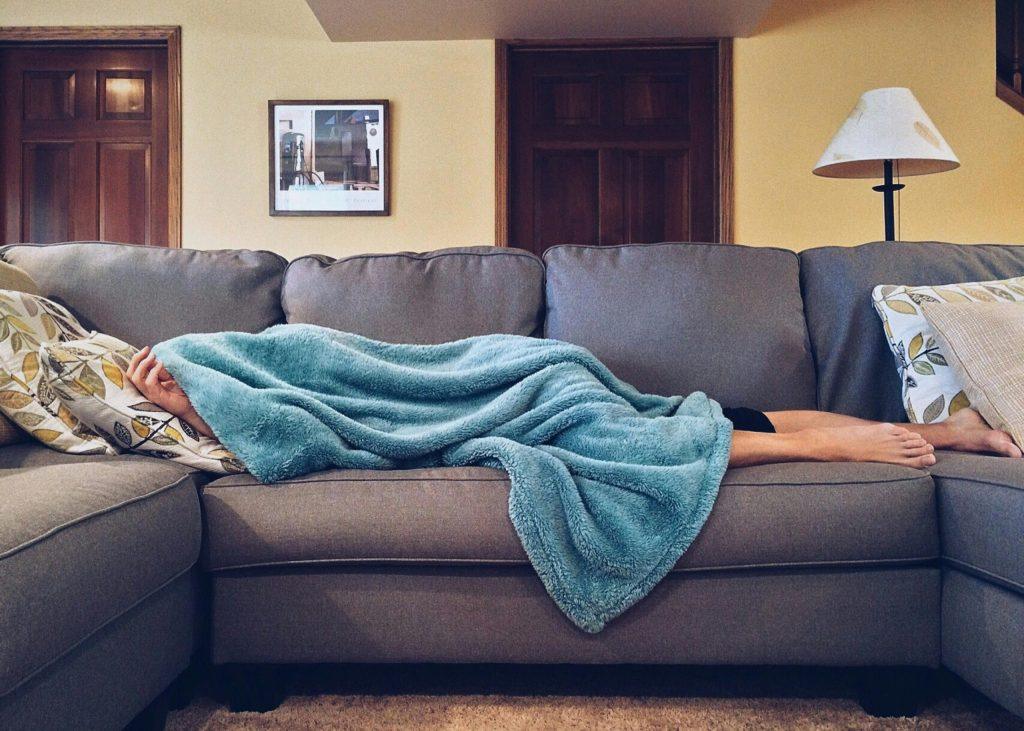 Person sleeping on a couch