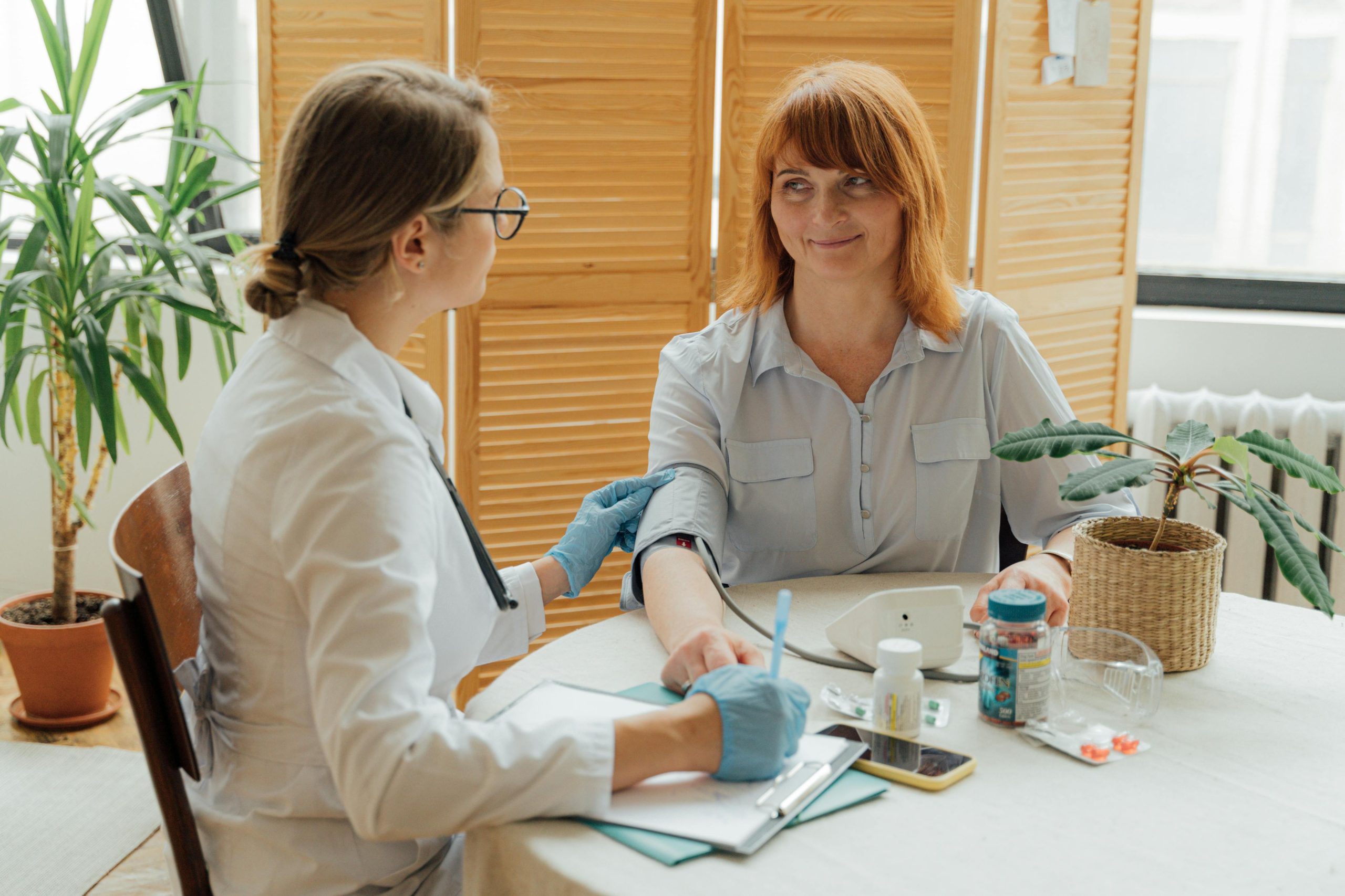 Woman having her blood pressure taken